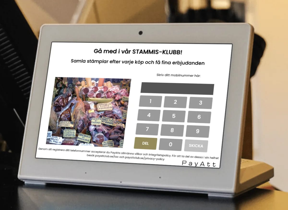 Registreringsskärm i en delibutik — kunden fyller i sitt mobilnummer