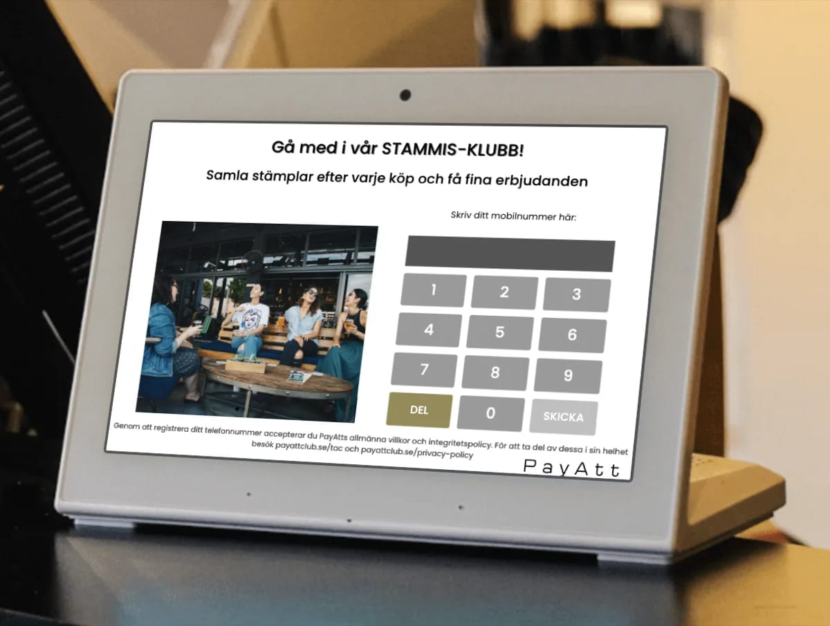 Registreringsskärm i en restaurang — kunden fyller i sitt mobilnummer