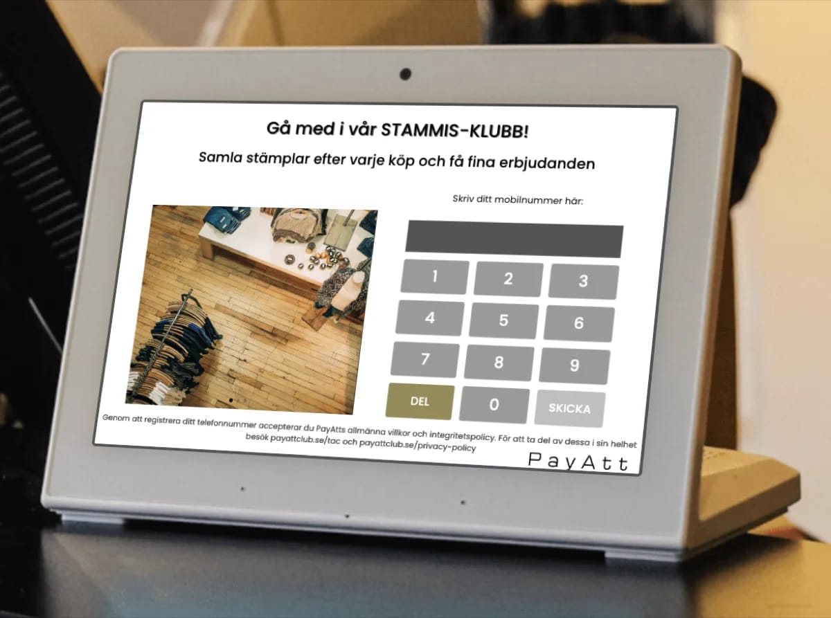 Registreringsskärm i en kläd- och inredningsbutik — kunden fyller i sitt mobilnummer